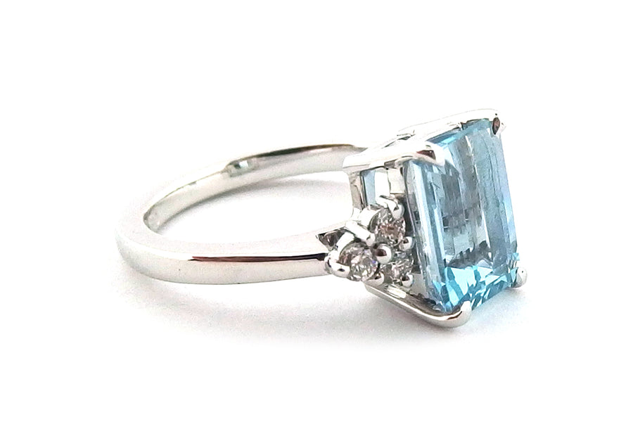 1.87ct Emerald cut Aquamarine set in a handmade 18ct white gold ring with six brilliant cut claw set diamonds