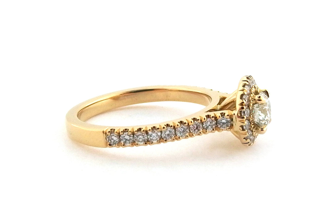 18ct all yellow gold round brilliant cut halo ring four claw set