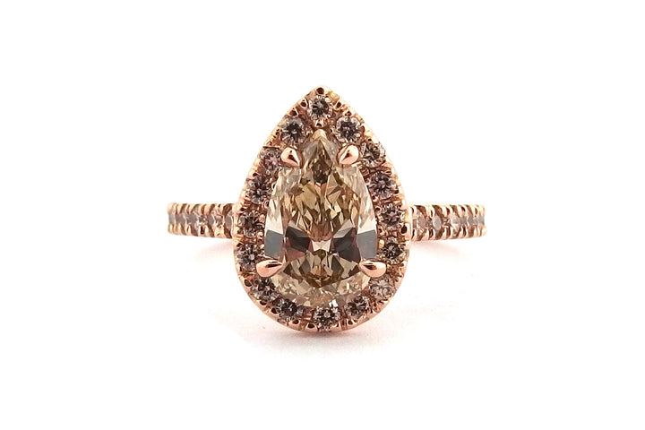 18ct rose gold pear shape halo ring
