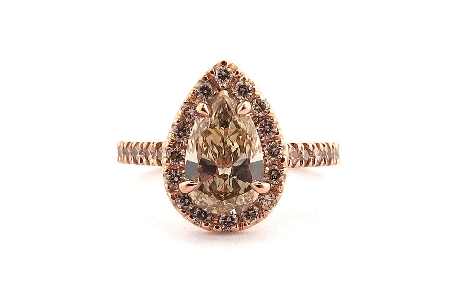 18ct rose gold pear shape halo ring