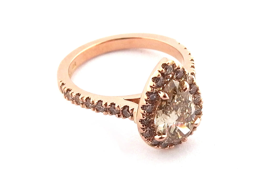 18ct rose gold pear shape halo ring