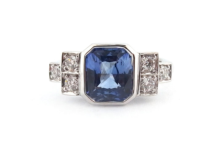 18ct white gold bezel set emerald cut sapphire ring