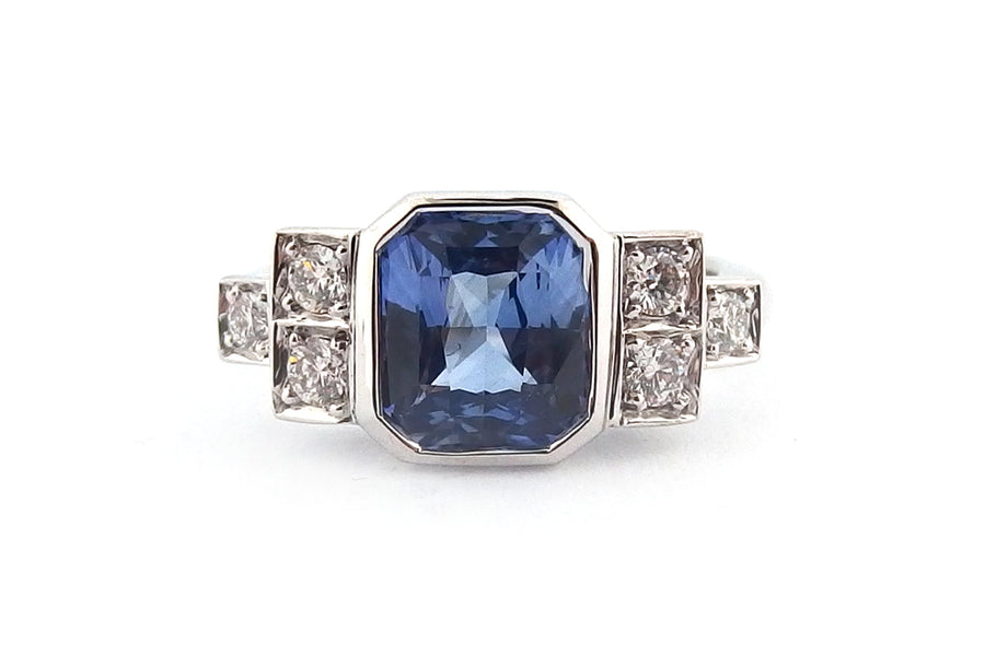 18ct white gold bezel set emerald cut sapphire ring