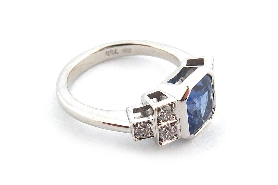 18ct white gold bezel set emerald cut sapphire ring