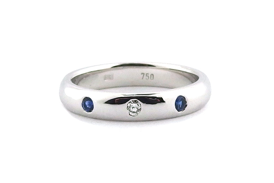 18ct white gold diamond and blue sapphire eternity ring