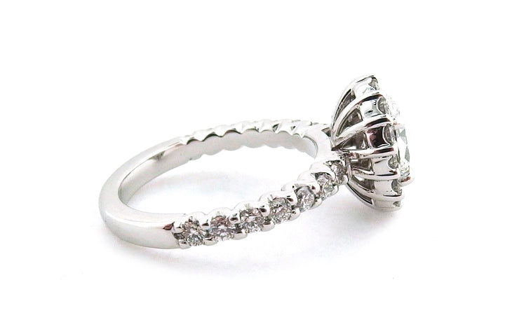 18ct white gold oval diamond with a cluster of round diamonds- front image