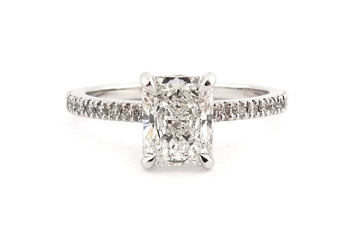18ct white gold radiant cut ring with a hidden halo
