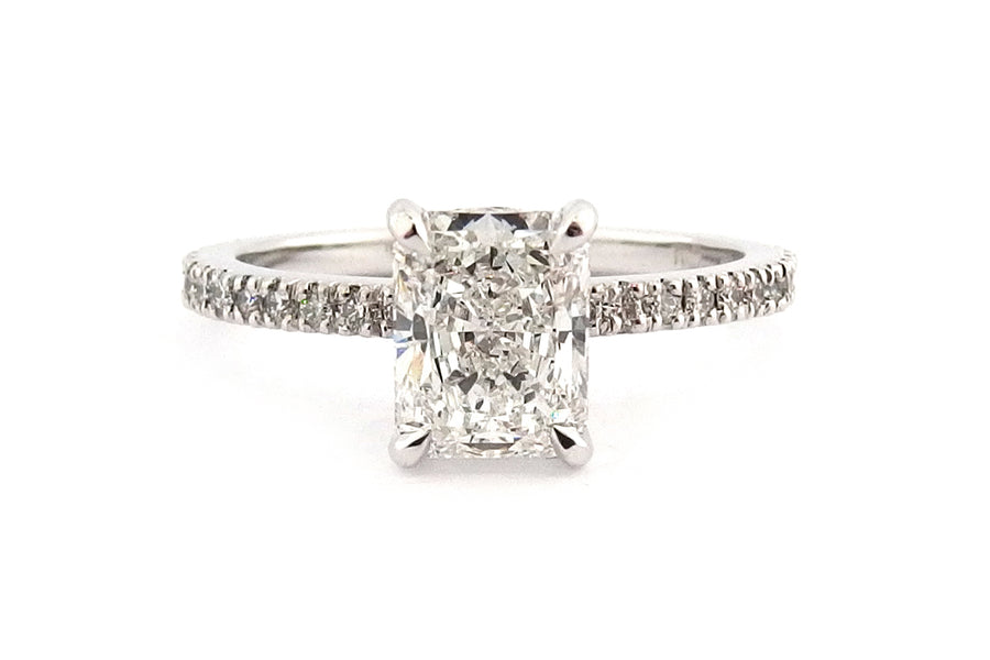 18ct white gold radiant cut ring with a hidden halo