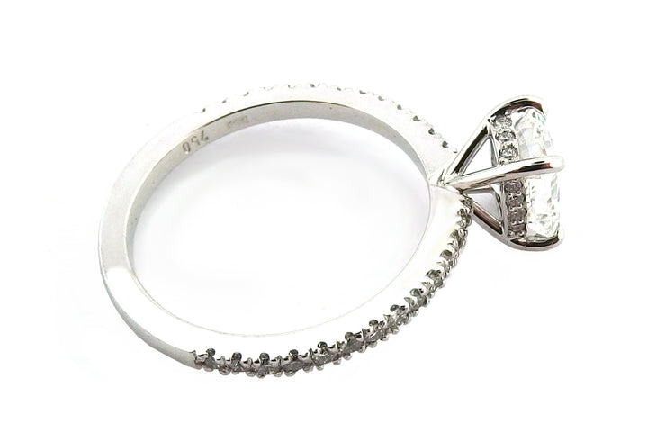 18ct white gold radiant cut ring with a hidden halo