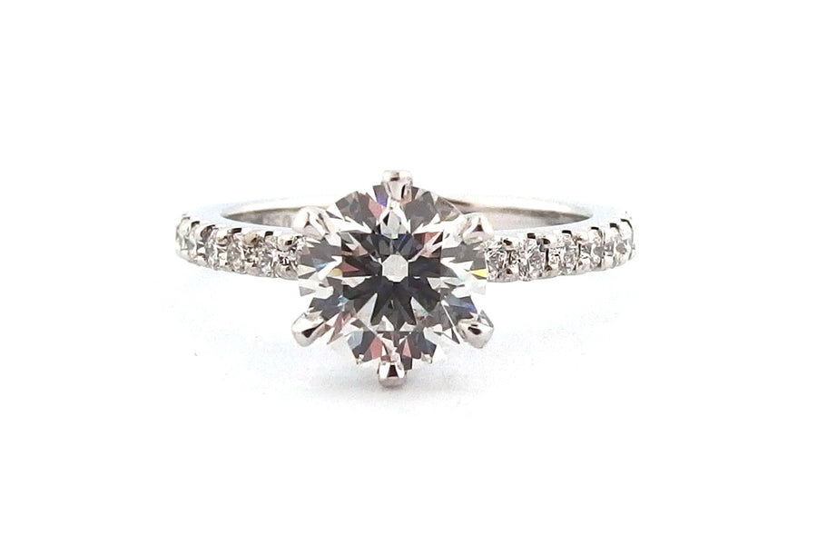 18ct white gold six claw set natural round brilliant cut diamond ring with diamonds on the band