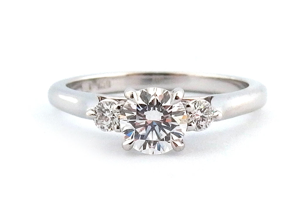 18ct white gold three stone ring with round brilliant cut diamonds claw set