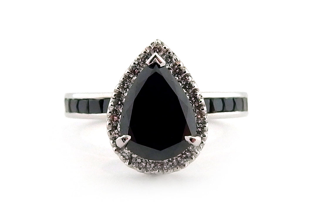 18ct white gold treated black diamond pear shape halo ring with treated back diamonds on the band