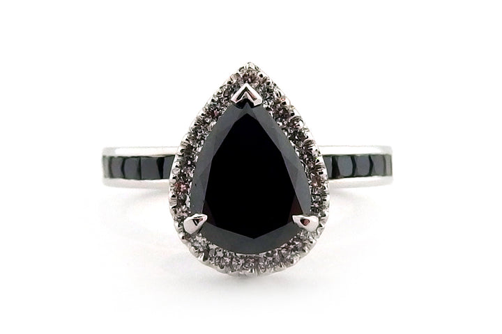 18ct white gold treated black diamond pear shape halo ring with treated back diamonds on the band