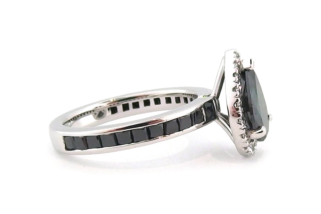 18ct white gold treated black diamond pear shape halo ring with treated back diamonds on the band