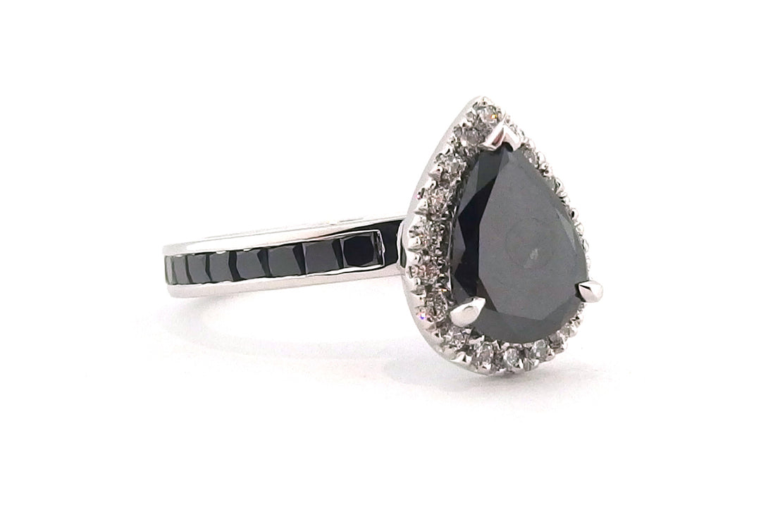 18ct white gold treated black diamond pear shape halo ring with treated back diamonds on the band