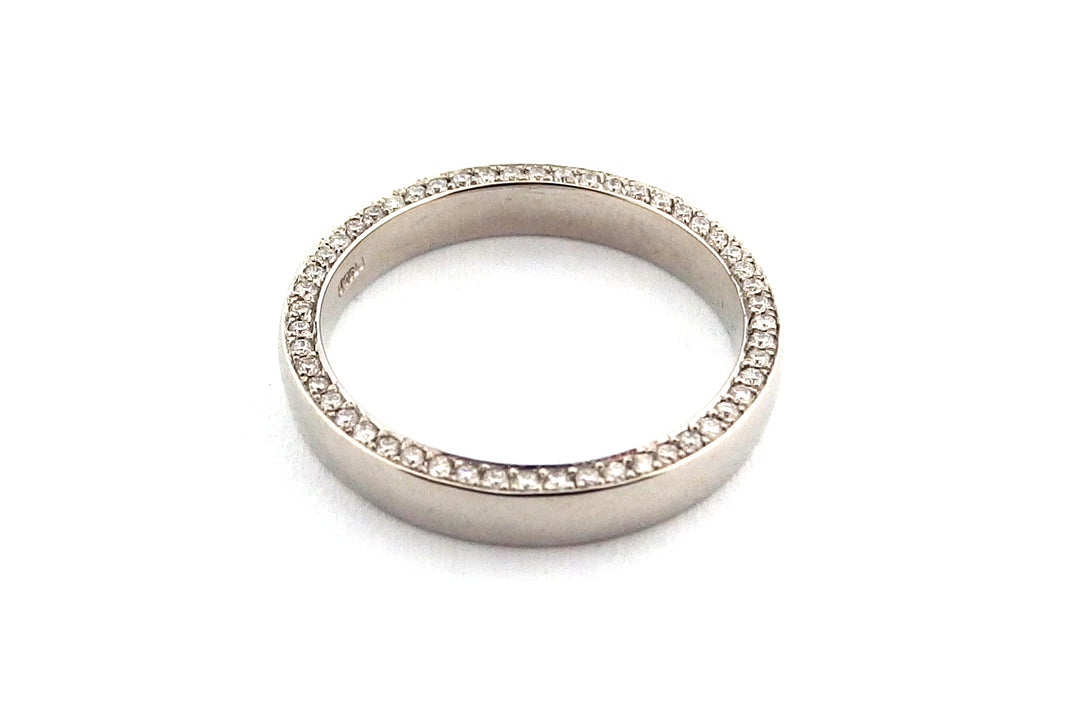 18ct white gold wedding ring with diamonds set on the side