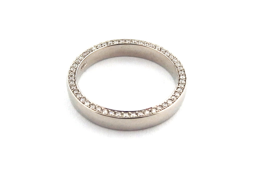 18ct white gold wedding ring with diamonds set on the side