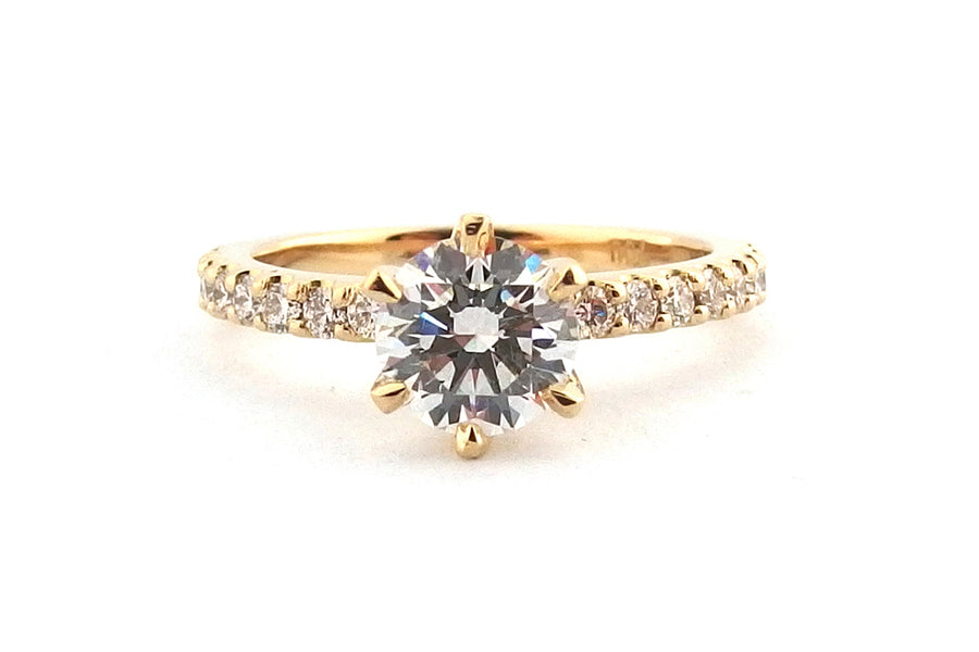 18ct yellow gold handmade engagement ring set with a round brilliant cut diamond