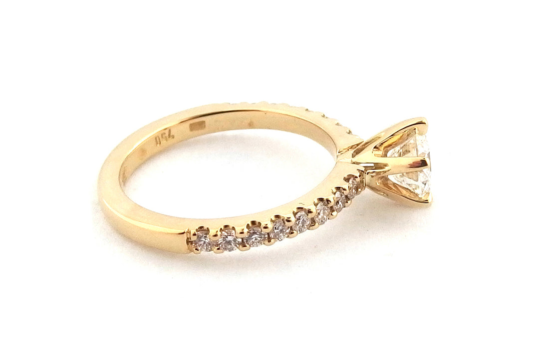 18ct yellow gold handmade engagement ring set with a round brilliant cut diamond
