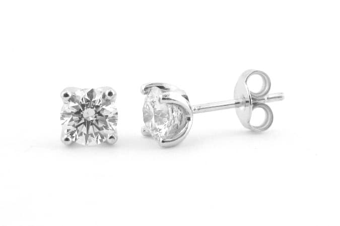 Round brilliant cut diamond earrings four claw set