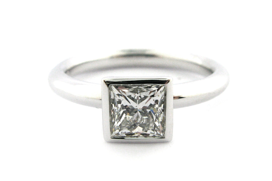 Bezel set princess cut diamond ring