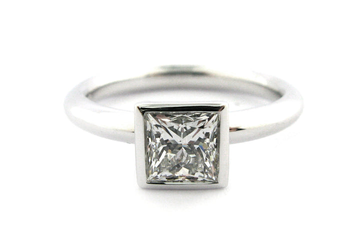 Bezel set princess cut diamond ring