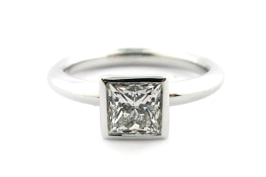 Bezel set princess cut diamond ring