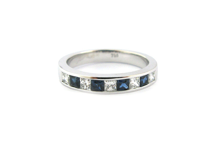Diamond and blue sapphire eternity ring
