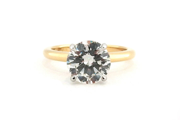 Classic 18ct two tone four claw round brilliant cut diamond ring