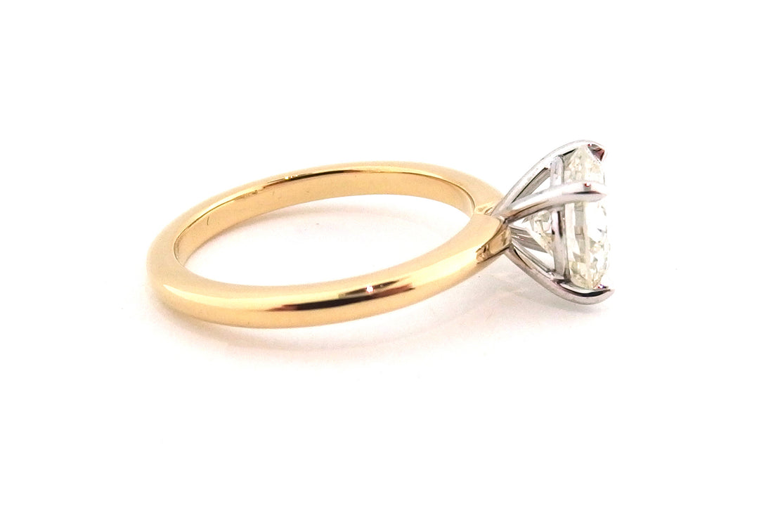 Classic 18ct two tone four claw round brilliant cut diamond ring