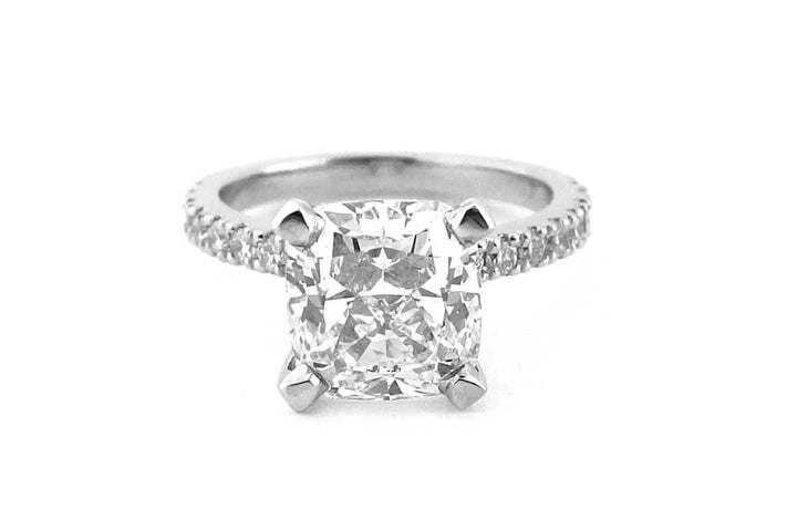 Cushion cut diamond ring with bead set diamonds