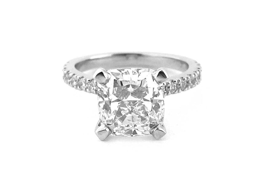Cushion cut diamond ring with bead set diamonds