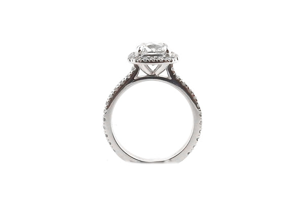 Cushion cut claw set halo ring