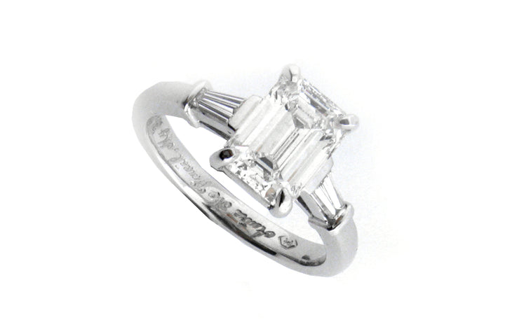Emerald cut diamond with tapered baguette side stones