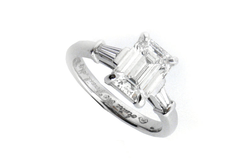 Emerald cut diamond with tapered baguette side stones