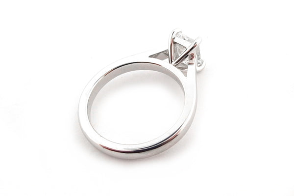 Emerald cut diamond claw set solitaire ring