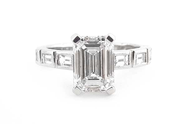 Emerald cut with bezel set baguette diamonds