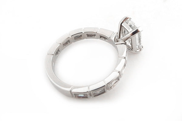 Emerald cut with bezel set baguette diamonds