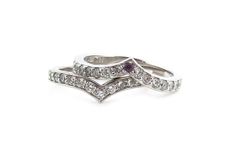 Matching pair of 'V' shaped diamond set wedding and eternity rings