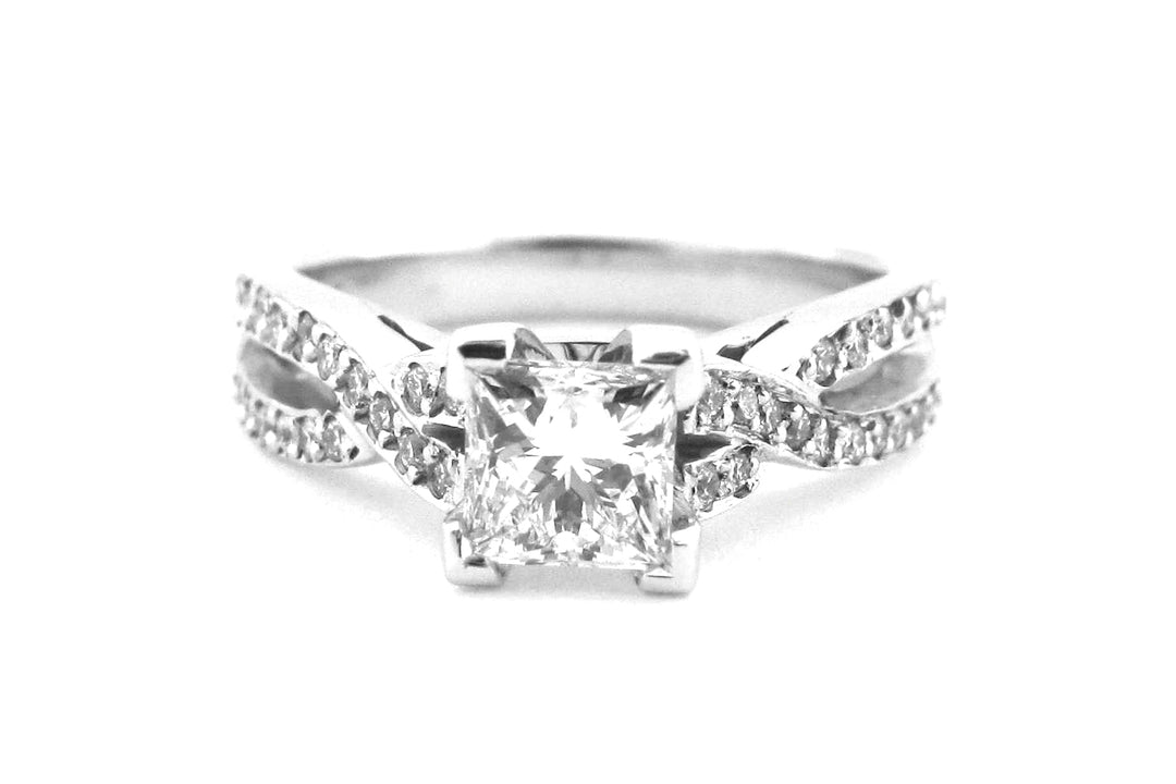Princess cut diamond ring with a double twisted band