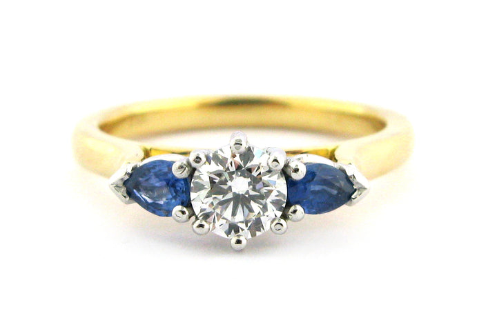 Sapphire and diamond three stone ring