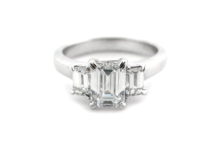 Three stone Emerald cut diamond ring