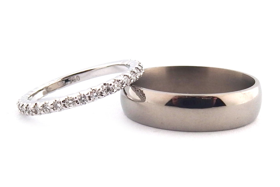 Titanium wedding band and a 18ct white gold diamond set wedding band