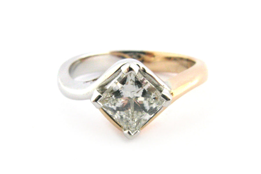 Two tone diamond ring with a twisted band