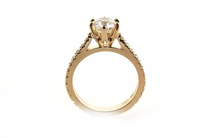All yellow gold round brilliant cut ring