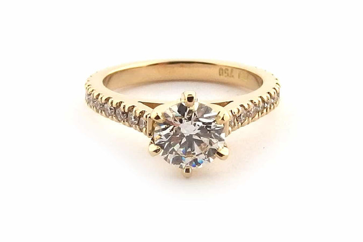 All yellow gold round brilliant cut ring