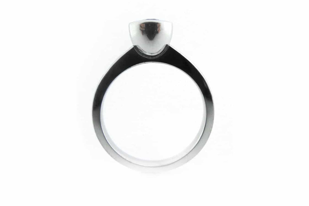 Bezel set round brilliant cut diamond ring