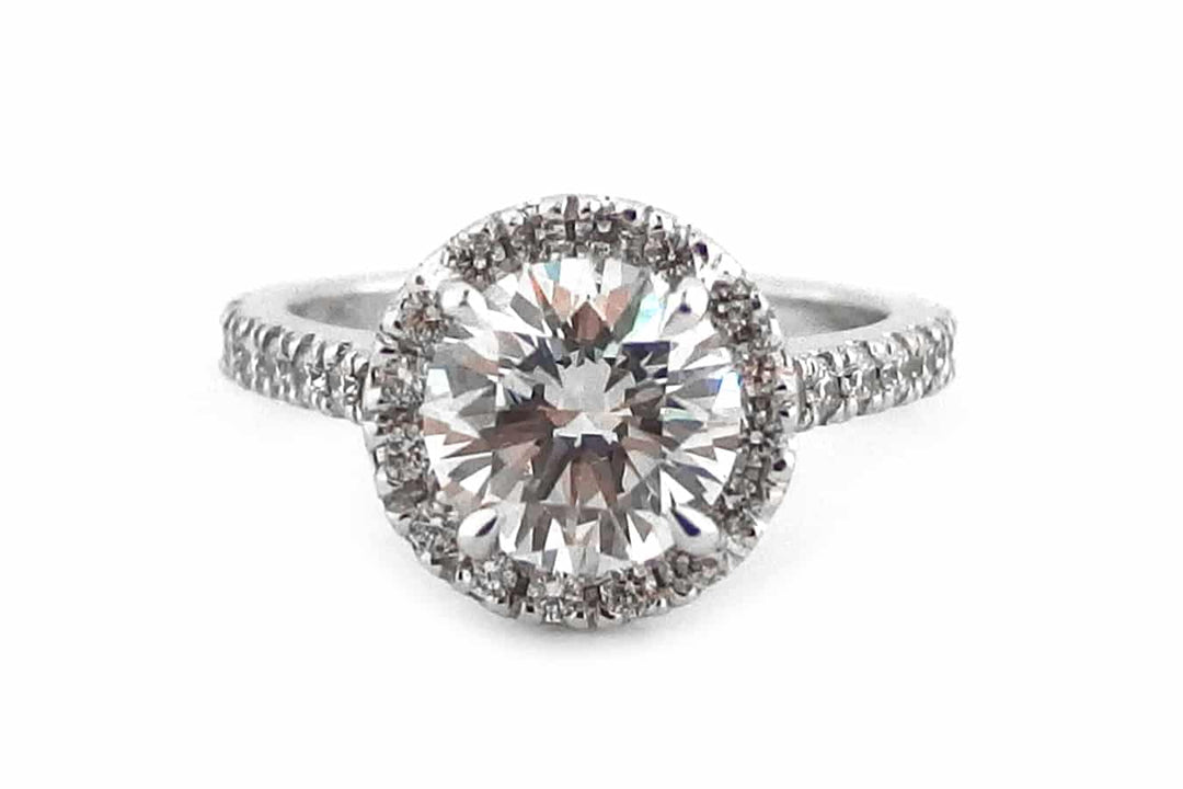 18ct White gold Halo Ring set with Brilliant cut Diamond