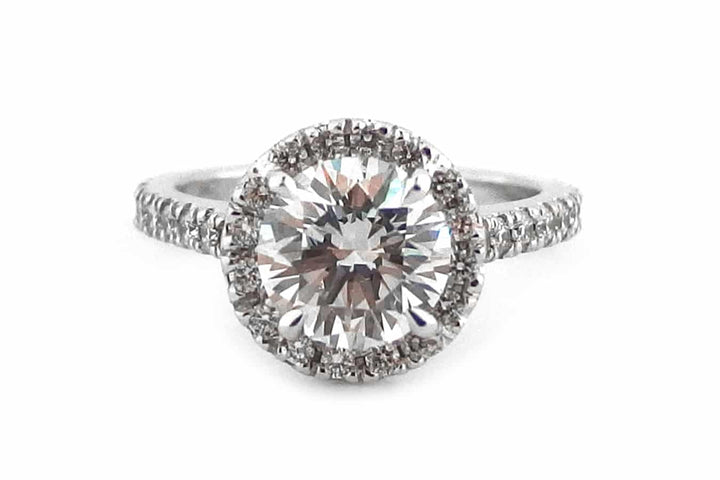 18ct White gold Halo Ring set with Brilliant cut Diamond