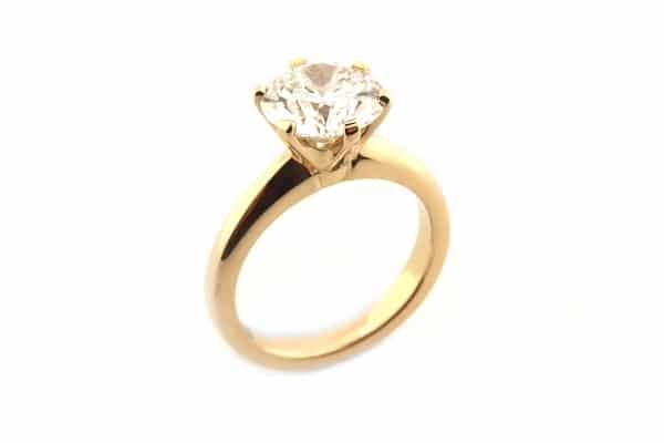 Classic yellow gold solitaire round brilliant cut ring